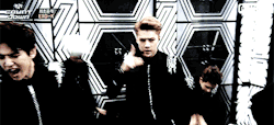 baeqn:  sehun couldn’t properly make the EXO sign because of