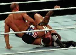 rwfan11:  Cesaro choking Orton with those furry,meaty thighs!
