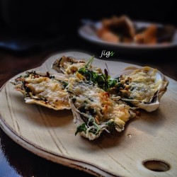 jigsrivera:  the rockefeller oysters: baked and topped with spinach