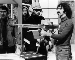error888:  Frank Zappa with a machine gun, 1960s 