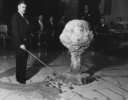 Using a scale model to demonstrate the effects of a nuclear explosion,