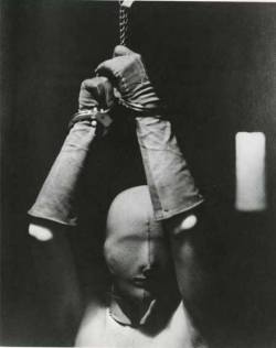 ekkert-heiti:  Man Ray Woman in mask and handcuffs