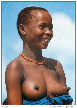   Kenyan Giriama woman, via Delcampe.   