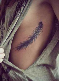 cymphar:  feather tattoo side rib find out more on tattoos :