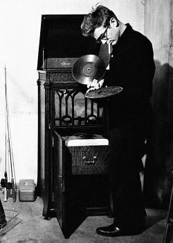 jamesdeaner:   James Dean looking through some records, photographed