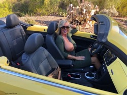 Wifey riding around with her top down. Yuk yuk yuk.