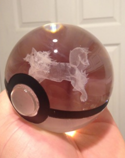 sixpenceee:  These crystal Poke Balls hold a 3D etched pokemon