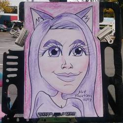 Caricatures at the Central Flea today!      Purple cat lady.