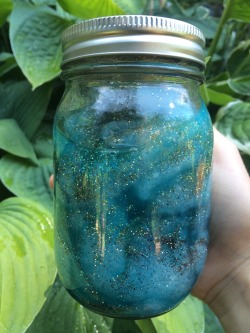 lazynature:  a girl I babysit made this cool “galaxy in a jar”