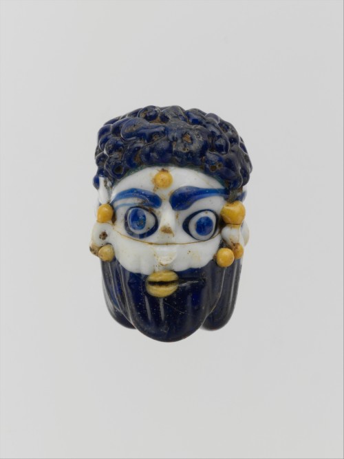 ancientart:  Phoenician or Carthaginian glass head pendants. The first dates to theÂ 5th century BCE, the second to theÂ mid 4thâ€“3rd century BCE, the third to ca. 450â€“300 BCE, and the fourth to theÂ 5th century BCE. Courtesy & currently located