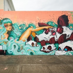 powwowblog:  Finished mural by @tatunga and @woes in Kakaako,