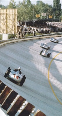 itsawheelthing:  what we miss â€¦ bankingsPiero Taruffi (Mercedes-Benz W196) trying to following the group of Juan Manuel Fangio (Mercedes-BenzÂ W196) who is leading Stirling Moss (Mercedes-BenzÂ W196) &amp; Karl Kling (Mercedes-BenzÂ W196) on the Curva