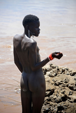 Nyangatom boy, by Jean-Christophe Huet.