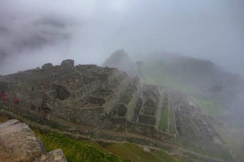 the mist slowly revealing machupicchu  Peru. Jan 2016.