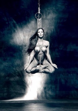 This is an excellent piece of bondage.  Meditation on her place. 
