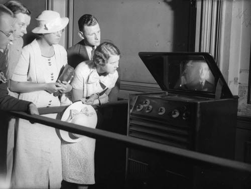 People watching a television set for the first time at Waterloo