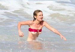 toplessbeachcelebs:  Kirsten Dunst (Actress) bikini slip in