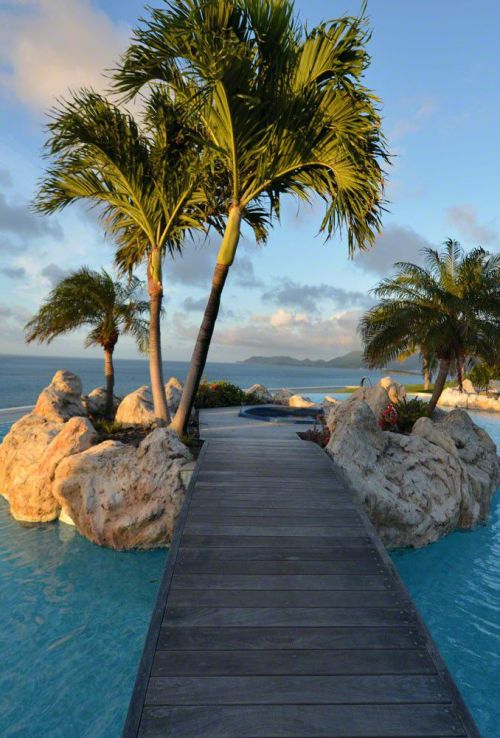 creativetravelspot:  Possibly our only villa pool with its own private island! Belle Etoile, St. Martin.