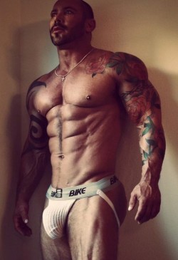 proudbulge:  Packing.   Inked, muscles, bearded and with an awesome