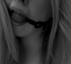 gaggedfantasies:  Gagged selfie! Loving my ball gag this afternoon