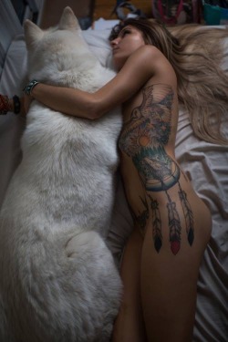 hot-girls-with-tattoos:  A girl and her dog (source) 