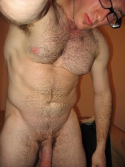 bannock-hou:  hairy, muscled guy wearing glasses. see more hairy