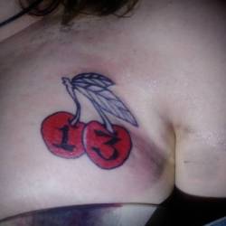 Recent tattoo of a couple o’ good luck cherries. Sat very