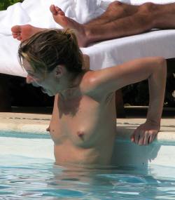 toplessbeachcelebs:  Kate Moss (Model) sunbathing topless in