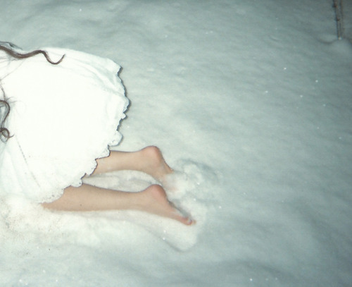 Kneeling on the snow