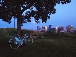 teapetalsart:saturday night’s moon // biking downtown.