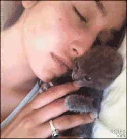Such a cute gif and then she gives the little kitten a really
