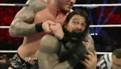 Randy trying to choke out Roman with his own hair