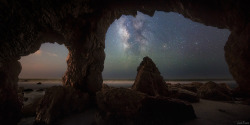 just–space:  Milky Way through a Double Window Sea Cave
