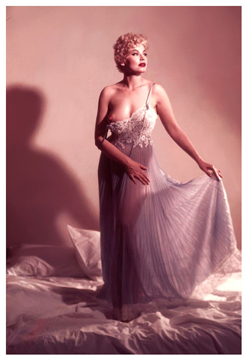 Lili St. Cyr         ..experiences a nip-slip! An image likely intended for use in one of ‘Her Intimate Secrets’ lingerie catalogs..