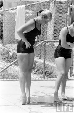 electronicsquid:  Kathy Hartwig stretches at the AAU swimming
