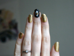 ladycrappo:  The Cosmic Eye, or: Every Gold Polish I Own At Once