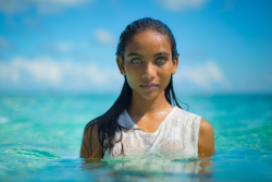 sixpenceee:  A stunning Maldivian girl with aqua blue eyes. 