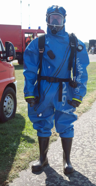 botteux69:very sexy Brandon stood locked into the rubber hazmat suit, still not entirely sure why.“Okay”, he said. “I’m sealed in. You were saying I needed to be in here for protection from the gas? Are we going somewhere there’ll be a gas leak?