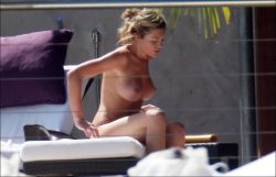 toplessbeachcelebs:  Abigail Clancy (British Model) sunbathing