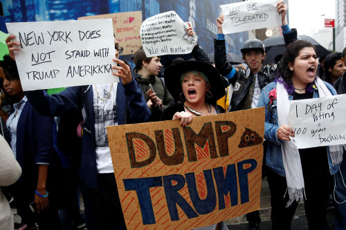 yahoonewsphotos:  Protests after Donald Trumpâ€™s victory As Donald Trump took the stage at the Hilton in Manhattan to deliver  his presidential acceptance speech early Wednesday morning, protesters  from New York to California took to the streets. See