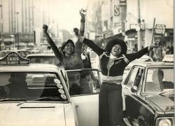 criticalmera:Two women dancing and shouting Black Power slogans
