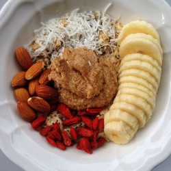 brooklynorganic:  Cooked warm oats with shredded coconut, banana,