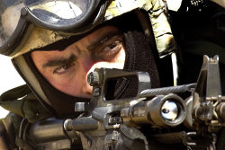 house-of-gnar:  Image of a Navy SEAL, taking aim with his M4A1