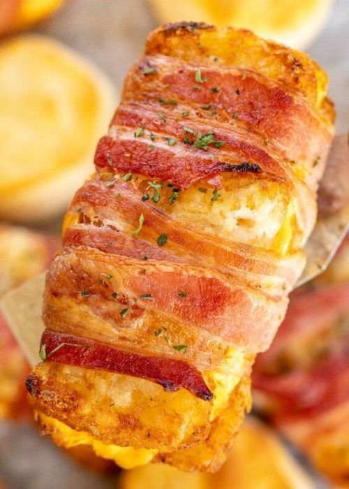 daily-deliciousness:  Bacon wrapped egg & cheese hash browns