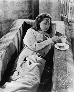 Carol Marsh takes a tea break on the set of Dracula (1958) 