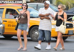 Anyone happen to notice the girl in the brown shirt is bra-less?