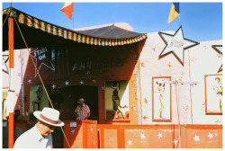 Vintage 50’s-era candid photo captures a Carnival  barker,