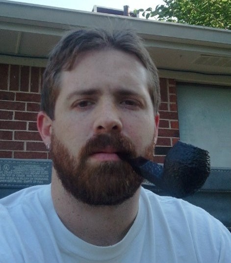 meta87:  Travis knew he should stop smoking the pipe, could feel it changing him as the beard grew in on his once smooth face, but he just couldn’t bring himself too inhaling another long puff from it, loving how the smoke filled his lungs he allowed