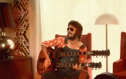 older-soul:Eric Clapton with double neck guitar, 1974 Photo by