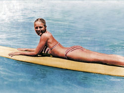 Cheryl Ladd in a bikini on a surfboard. It doesn’t get